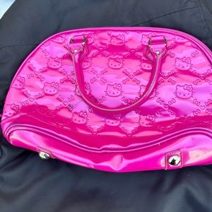 Pink hello kitty duffel bag.